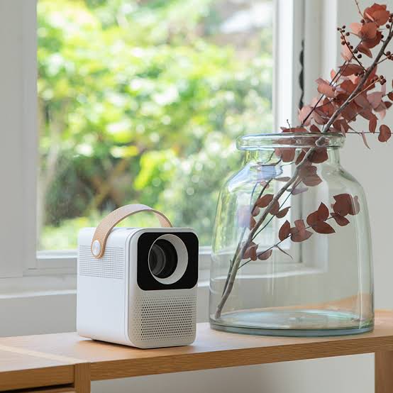 WOWOTO V1 Premium High-Performance Smart Portable Projector with Native 1920x1080 Resolution, 3.97 Inch TFT Display, Four-Way Keystone Correction & RGB-LED Light Source